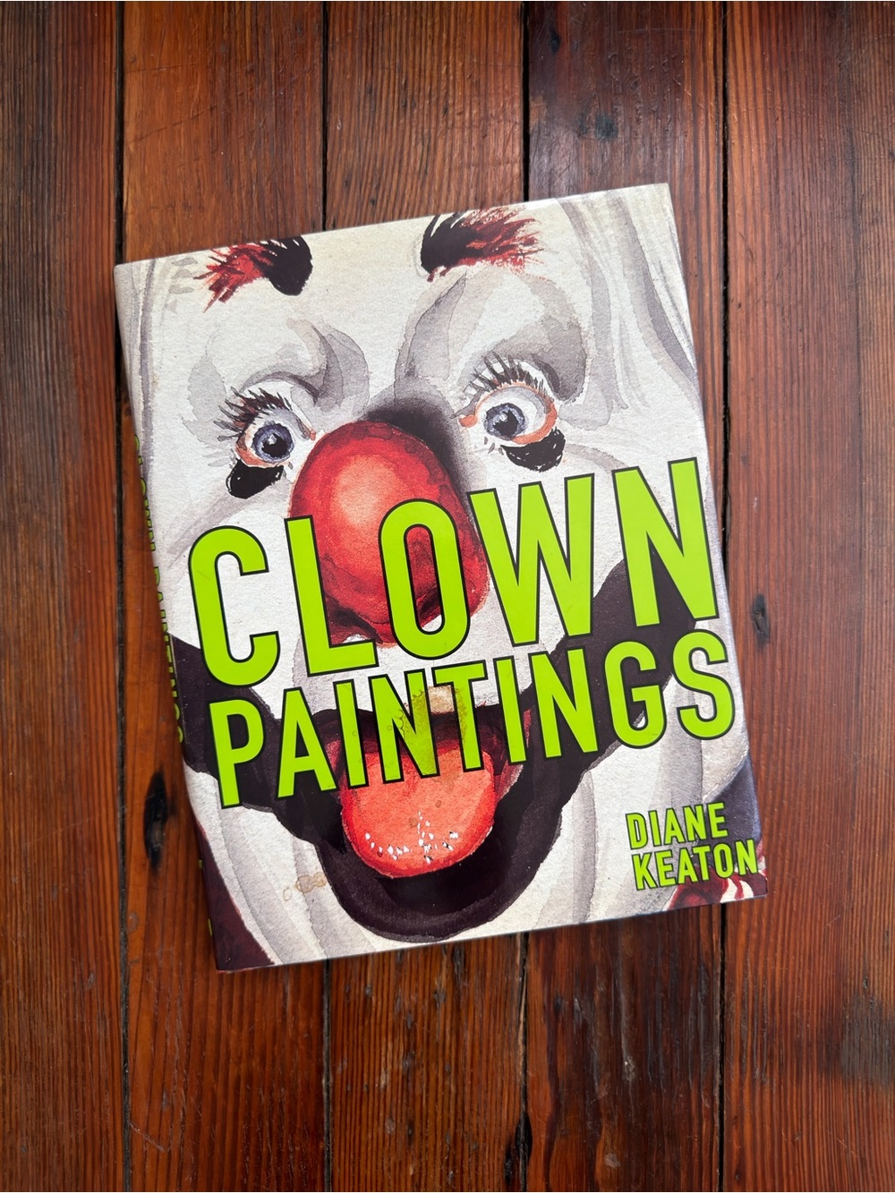 Clown paintings compiled by Diane Keaton w texts by American comedians